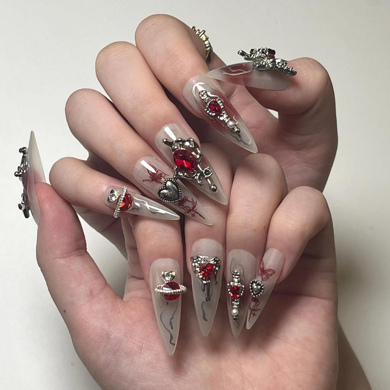 Acrylic Stiletto Nails With Red Rhinestone Accents on Luulla