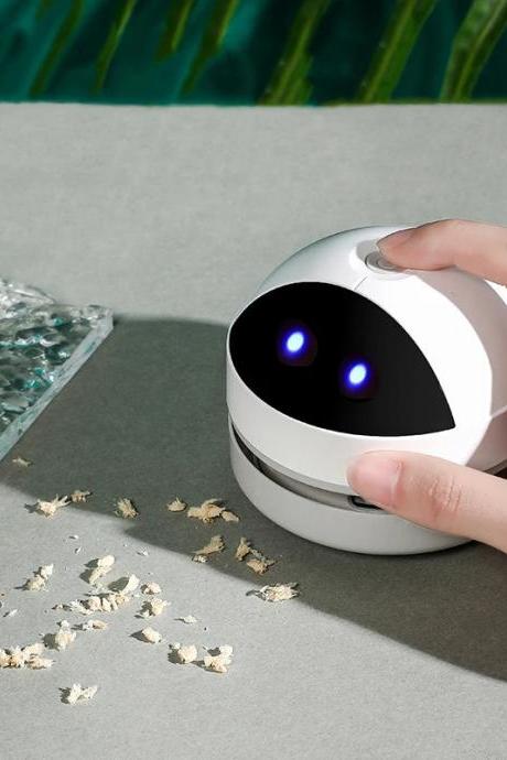 Compact Desktop Vacuum Cleaner With Cute Robotic Design