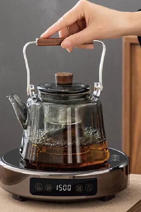 Glass Tea Kettle With Infuser On Electric Warmer Base